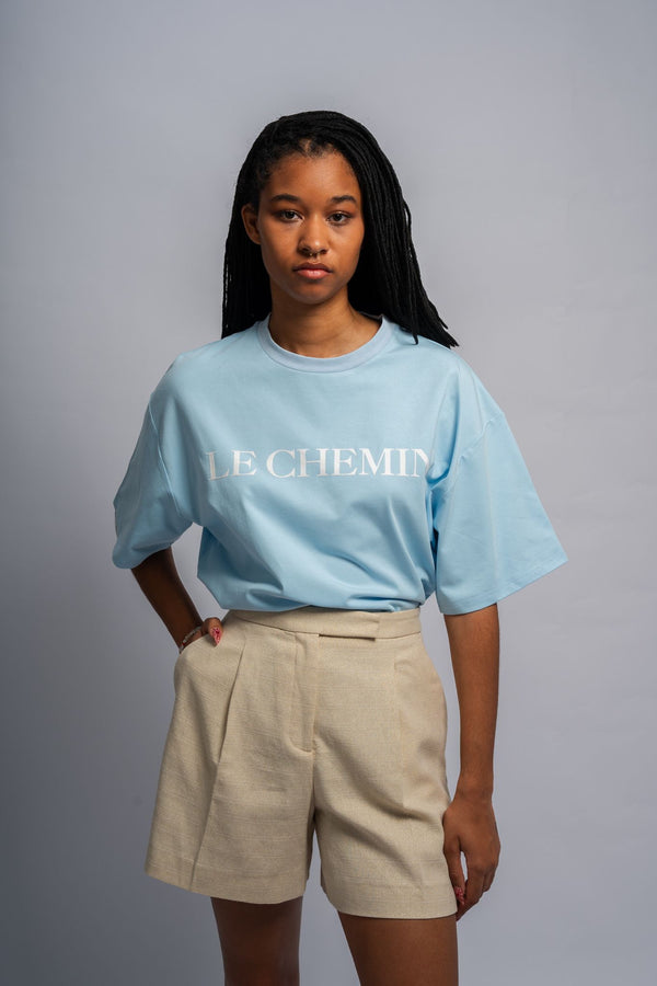 Le Chemin Women's Sky Blue Cotton Tee with White Flocked Design
